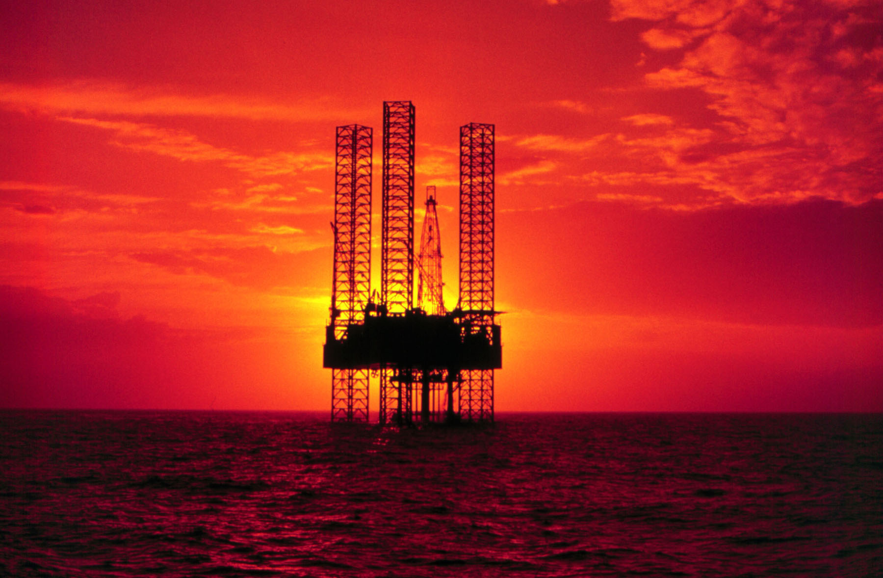 Pennzenergy Company Oil Exploration Drilling Rig In The Gulf Of Mexico During Sunset (Ph